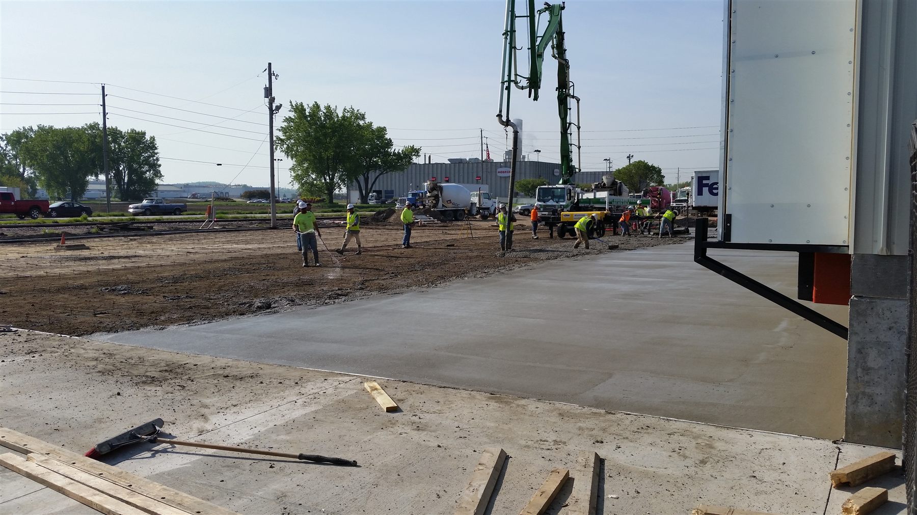 RJ Tide crew pouring site concrete paving