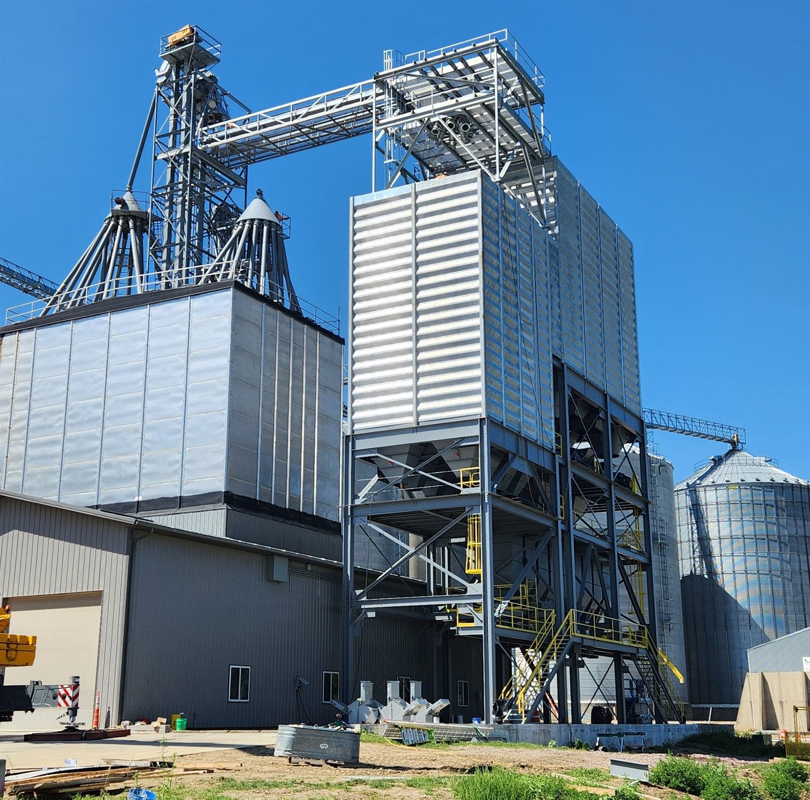 Completed grain elevator and storage facility with silos